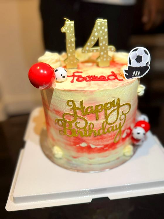 Number fourteen football birthday cake
