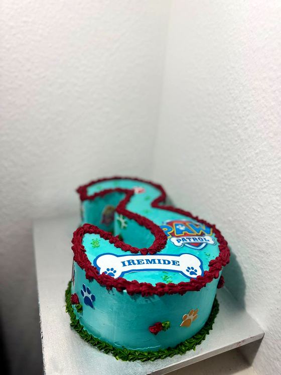 Character themed third birthday cake