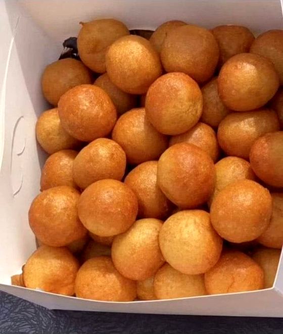 A box of freshly fried puff puff